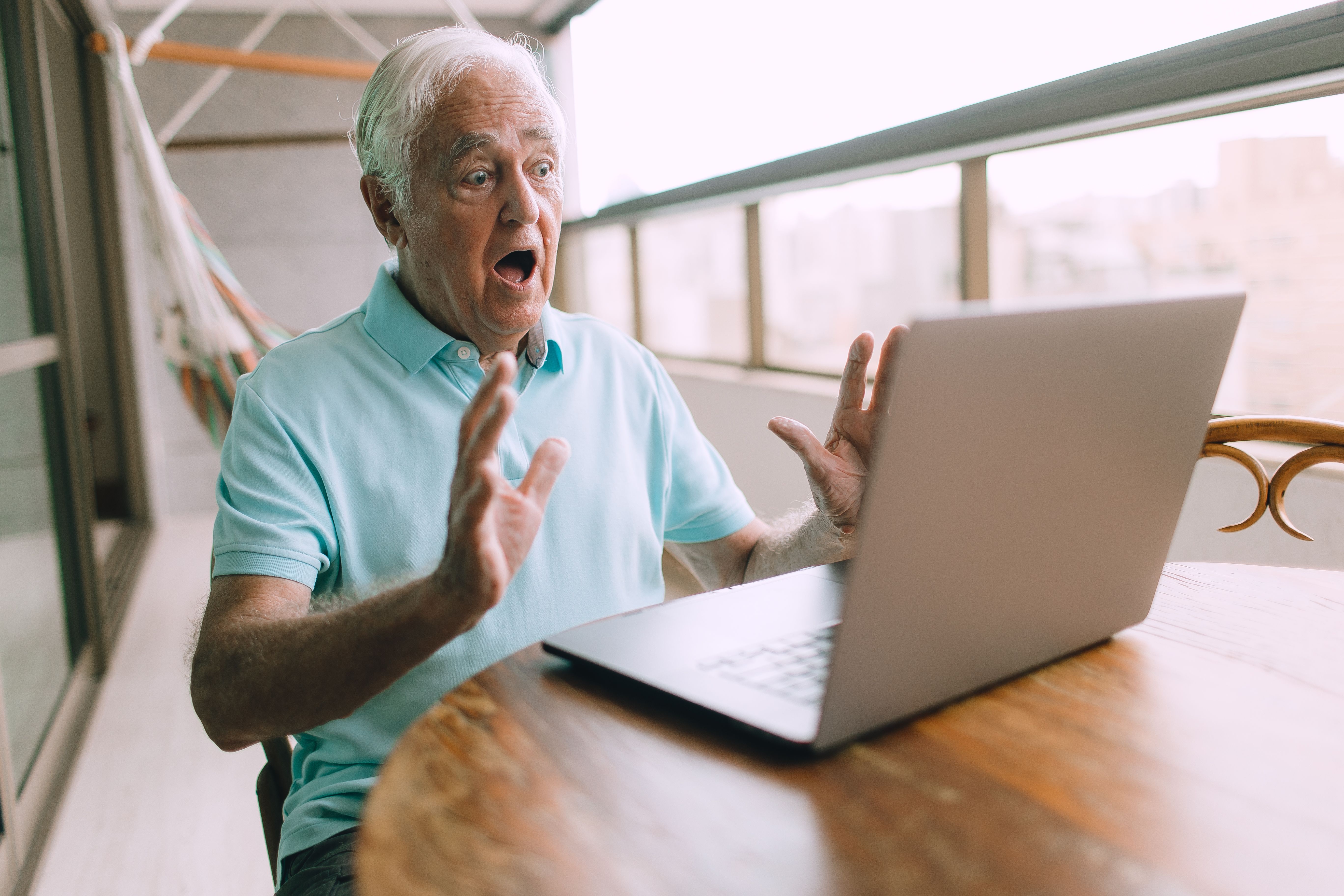 Senior using laptop